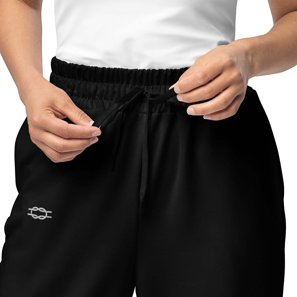 Urban Halo black wide-leg joggers featuring an elastic drawstring waistband and a small white logo detail.